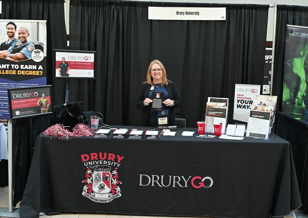 Industry representative exhibiting at the ILEETA Conference and Expo
